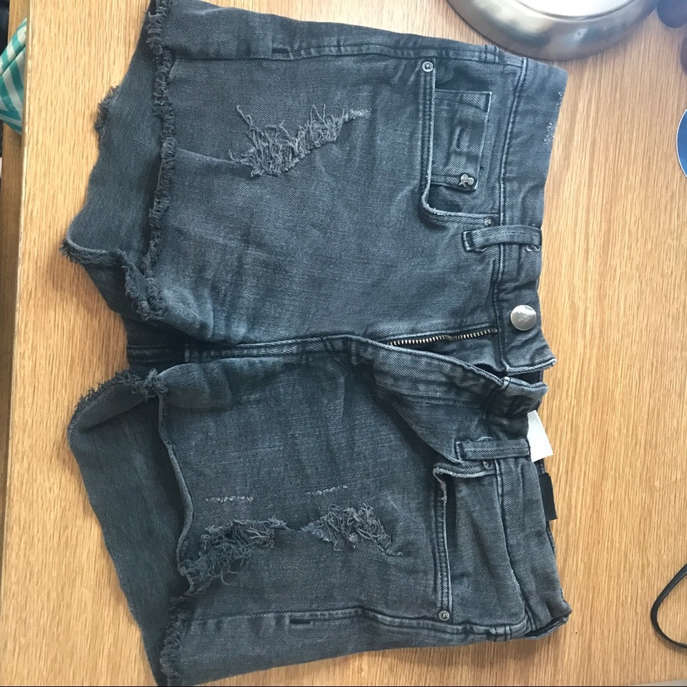 Black ripped denim shorts